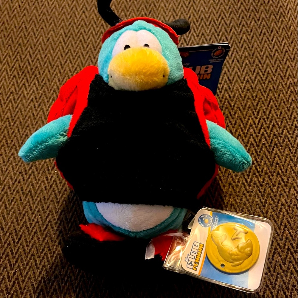 Club Penguin Ladybug  Series 9 with Tag and Unused coins attached